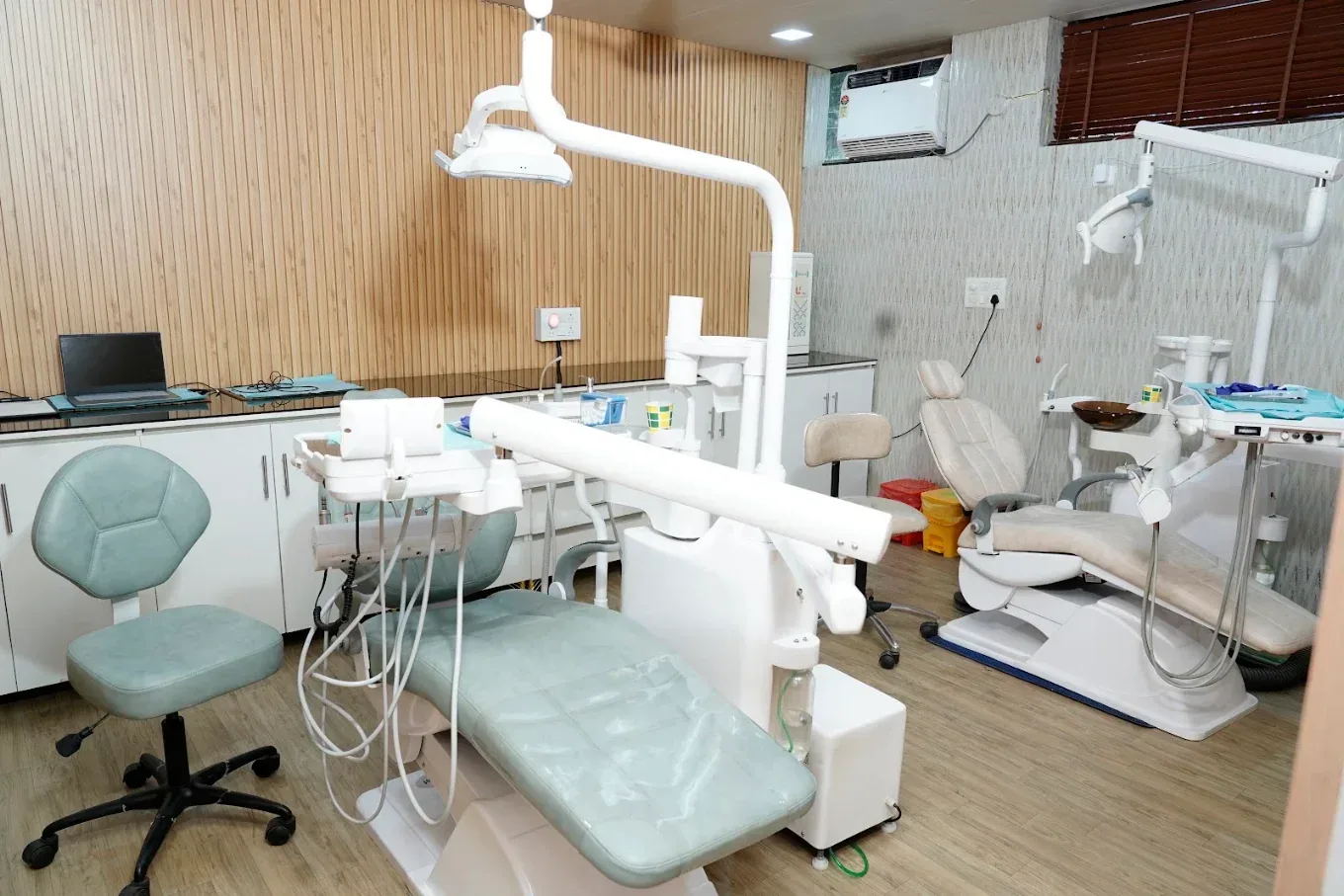 Interior of Dr. Supreet's Dental & Implant Centre in Sector 39, Gurugram, showing dental treatment chairs and equipment